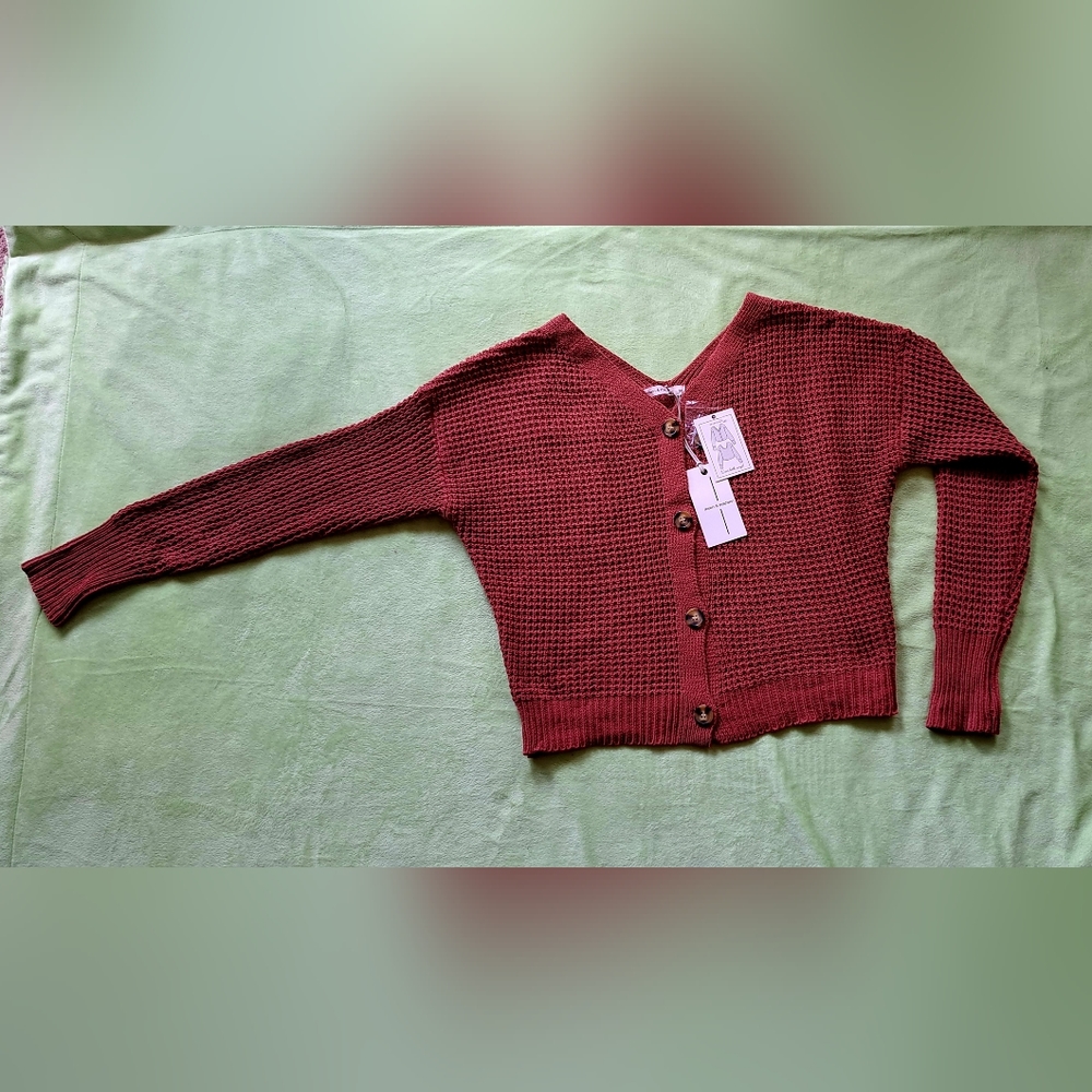 New sweater, moon & madison brand, reversible, brick color, size M.